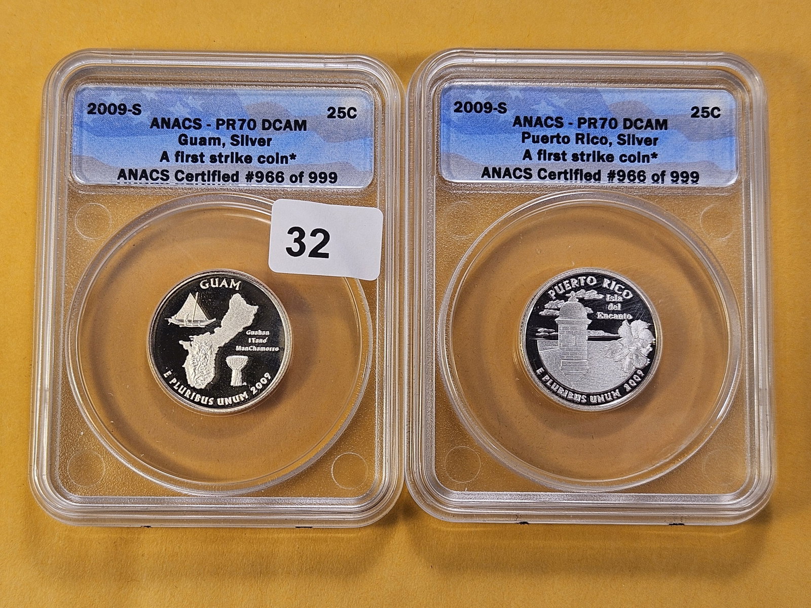 PERFECT! Two ANACS 2009-S Washington Silver Quarters in Proof 70 Deep Cameo: Perfect Grades! Puerto Rico and Guam