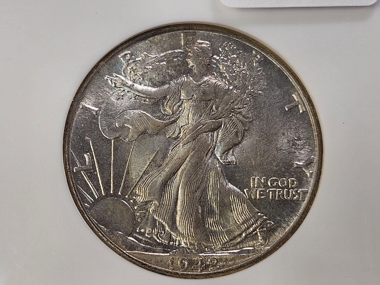 GEM! NGC 1942 Walking Liberty Silver Half Dollar in Mint State 65: From the Nevada Silver Collection