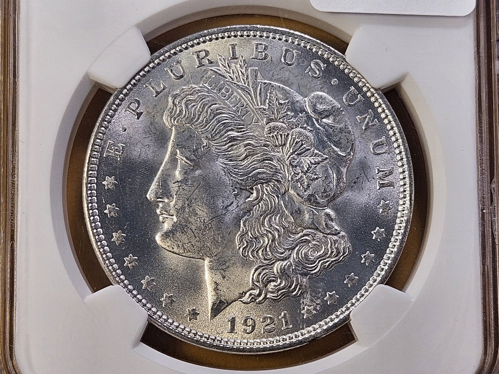 NGC 1921 Morgan Silver Dollar in Mint State 63: From the Mcclaren Collection
