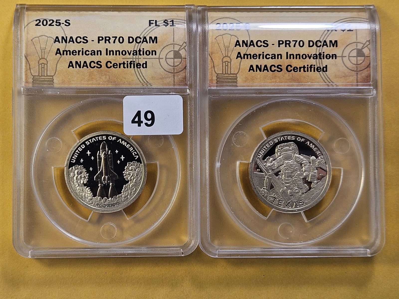 PERFECT! Two ANACS 2025-S Innovation Dollars in Proof 70 Deep Cameo: Perfect Grades! Space themed, Florida and Texas