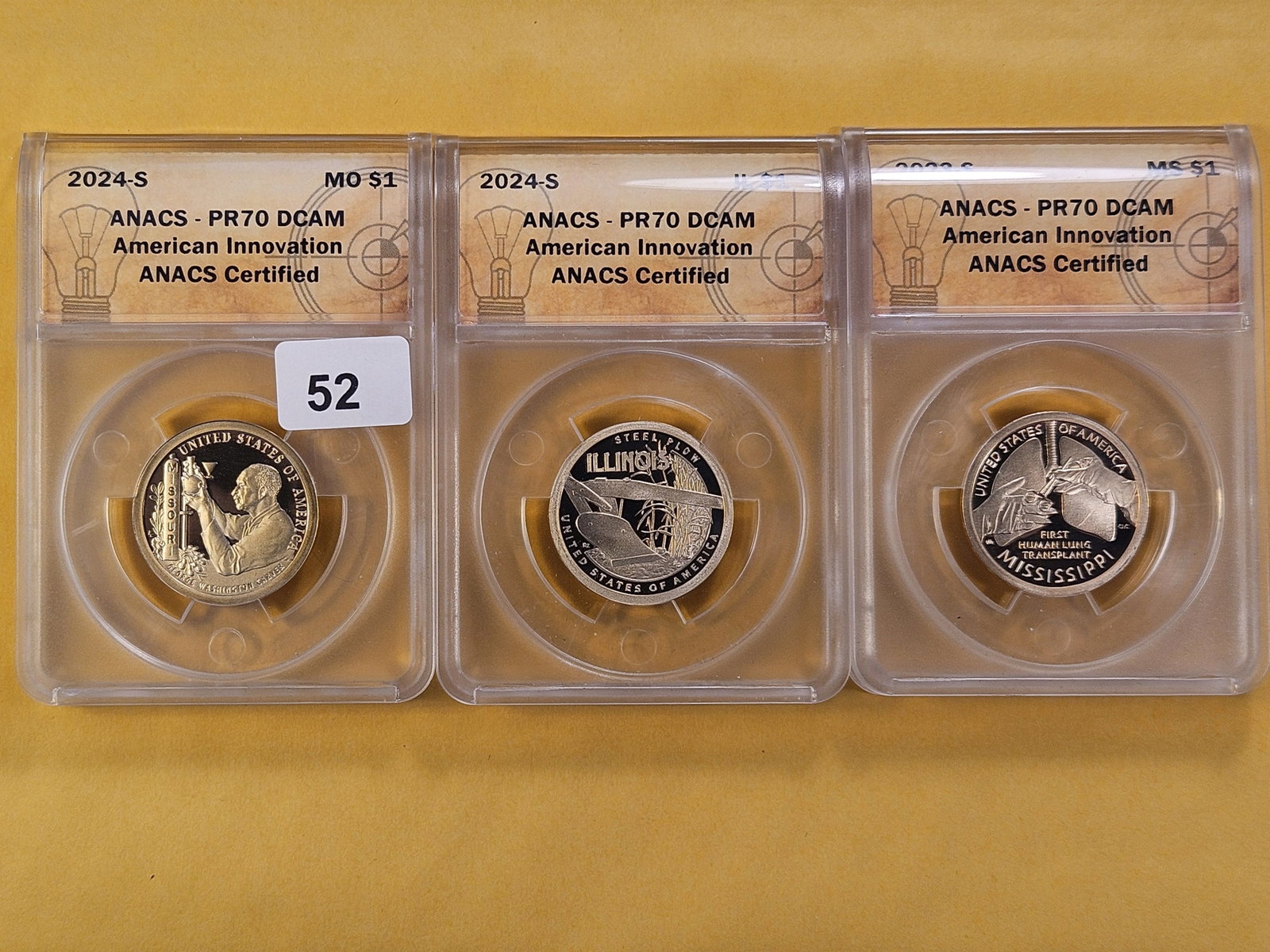 PERFECT! Three ANACS Innovation Dollars in Proof 70 Deep Cameo: Perfect Grades! Two 2024-S and a 2023-S