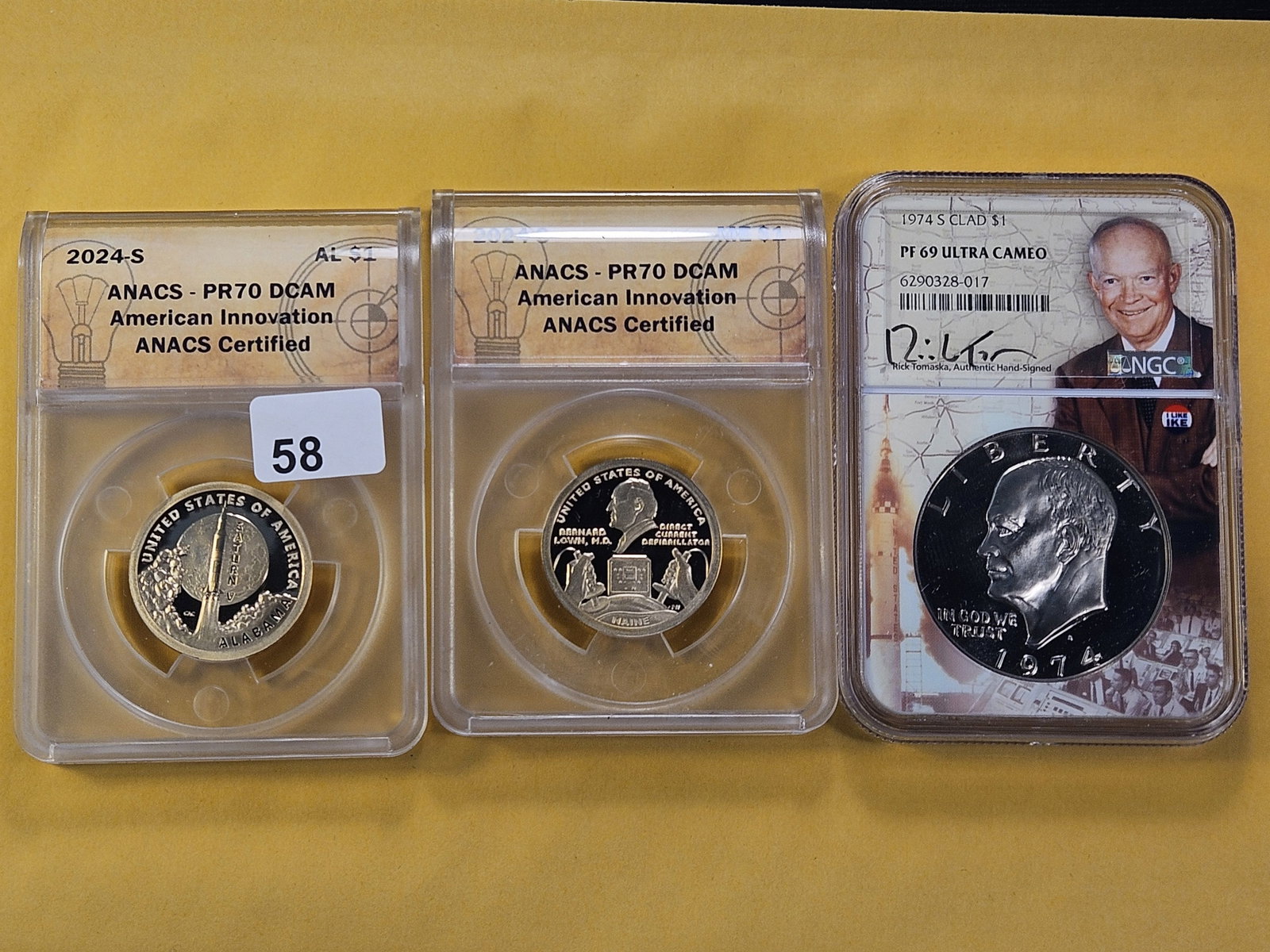 PERFECT! Two ANACS 2024-S Innovation Dollars in Proof 70 Deep Cameo with an NGC Eisenhower Dollar... (1 of 7)
