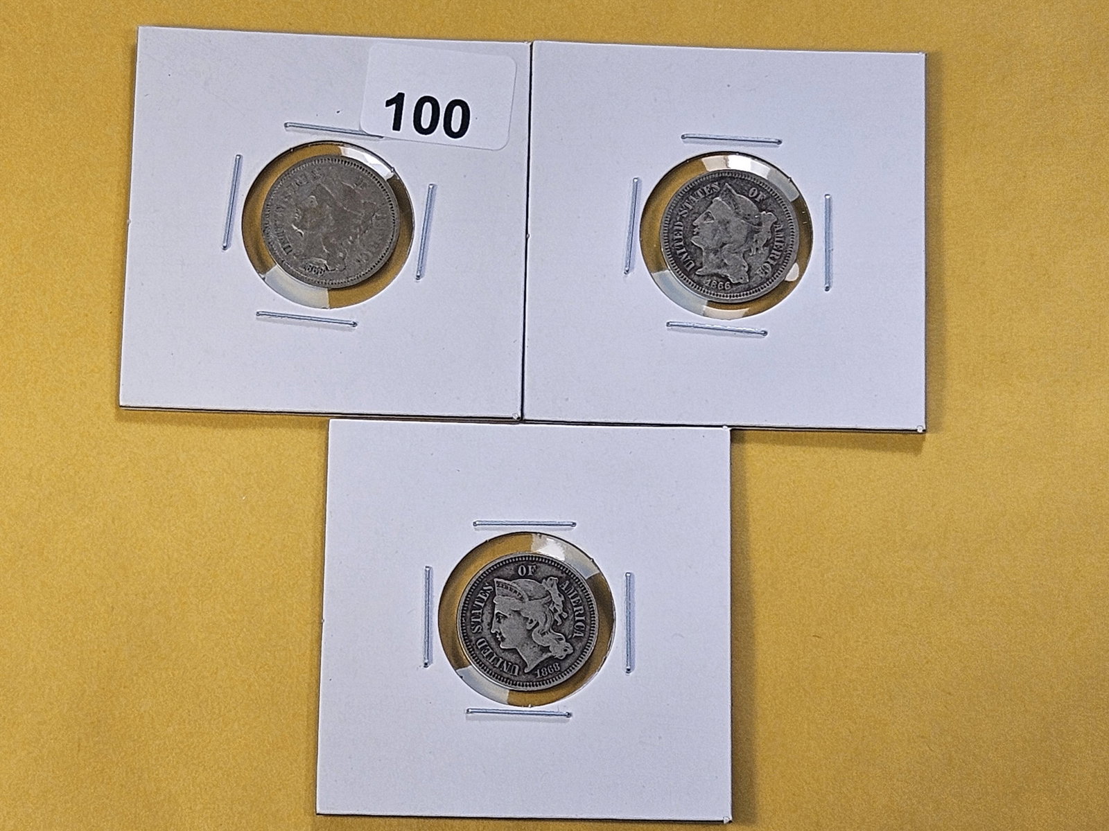 Three Circulated Three Cent Nickels: 1866 and two 1868