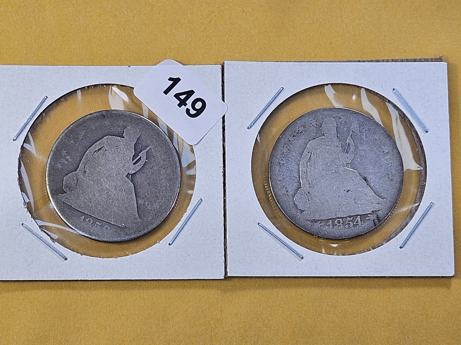 Two Circulated Seated Liberty Silver Half Dollars: 1854 Arrows and 1858