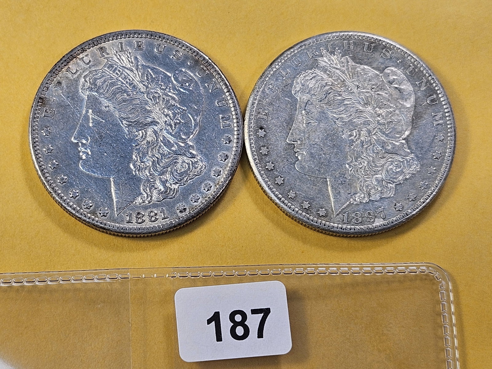 Two About Uncirculated Morgan Silver Dollar: 1881-S and 1897-S