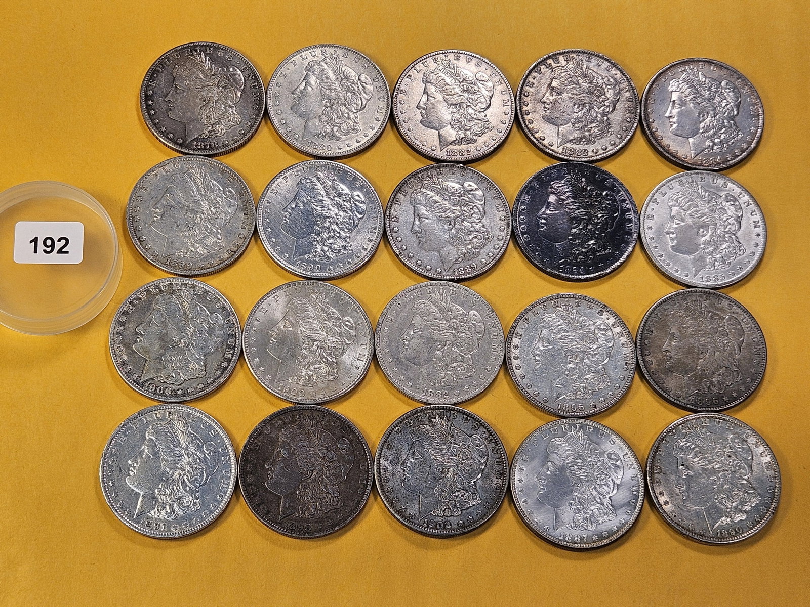 **FULL ROLL** Twenty Morgan Silver Dollars: Mixed dates all pre-1904. Mixed grades Very Good to About Uncirculated -details