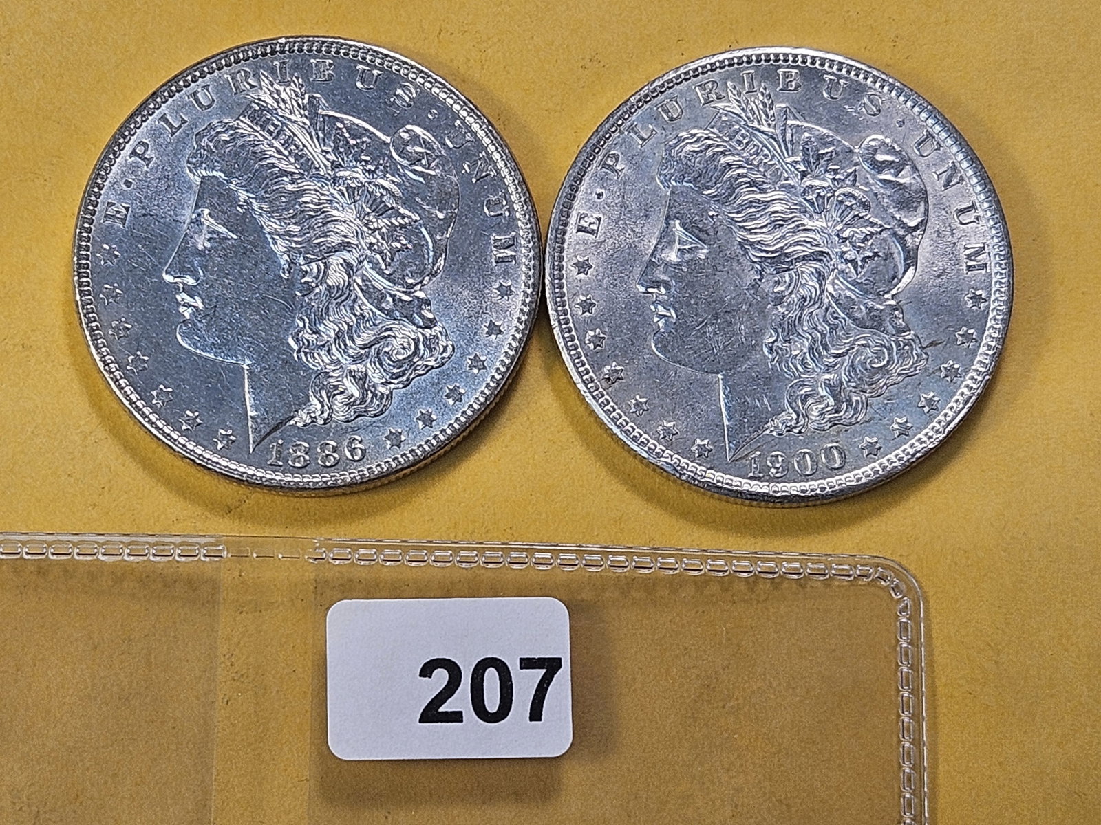 Two About Uncirculated Morgan Silver Dollar: 1896 and 1900