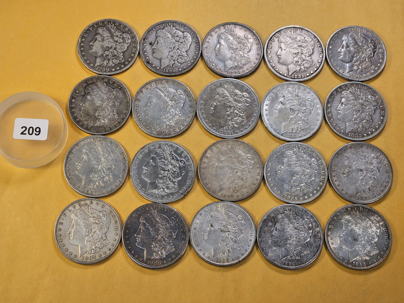 **FULL ROLL** Twenty Morgan Silver Dollars: Mixed dates all pre-1904. Mixed grades Very Good to About Uncirculated -details