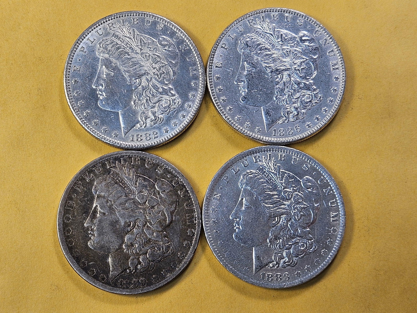 Four Circulated Morgan Silver Dollars - 2
