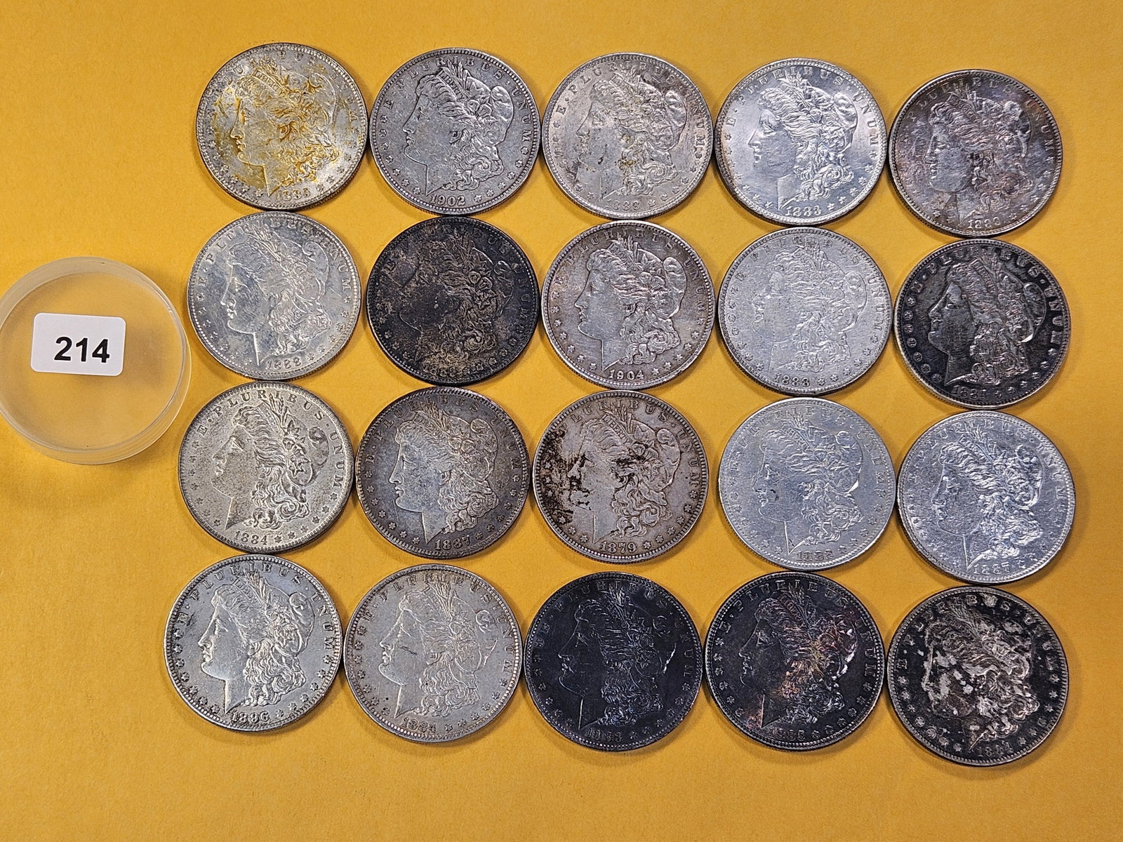 **FULL ROLL** Twenty Morgan Silver Dollars: Mixed dates all pre-1904. Mixed grades Very Good to About Uncirculated -details
