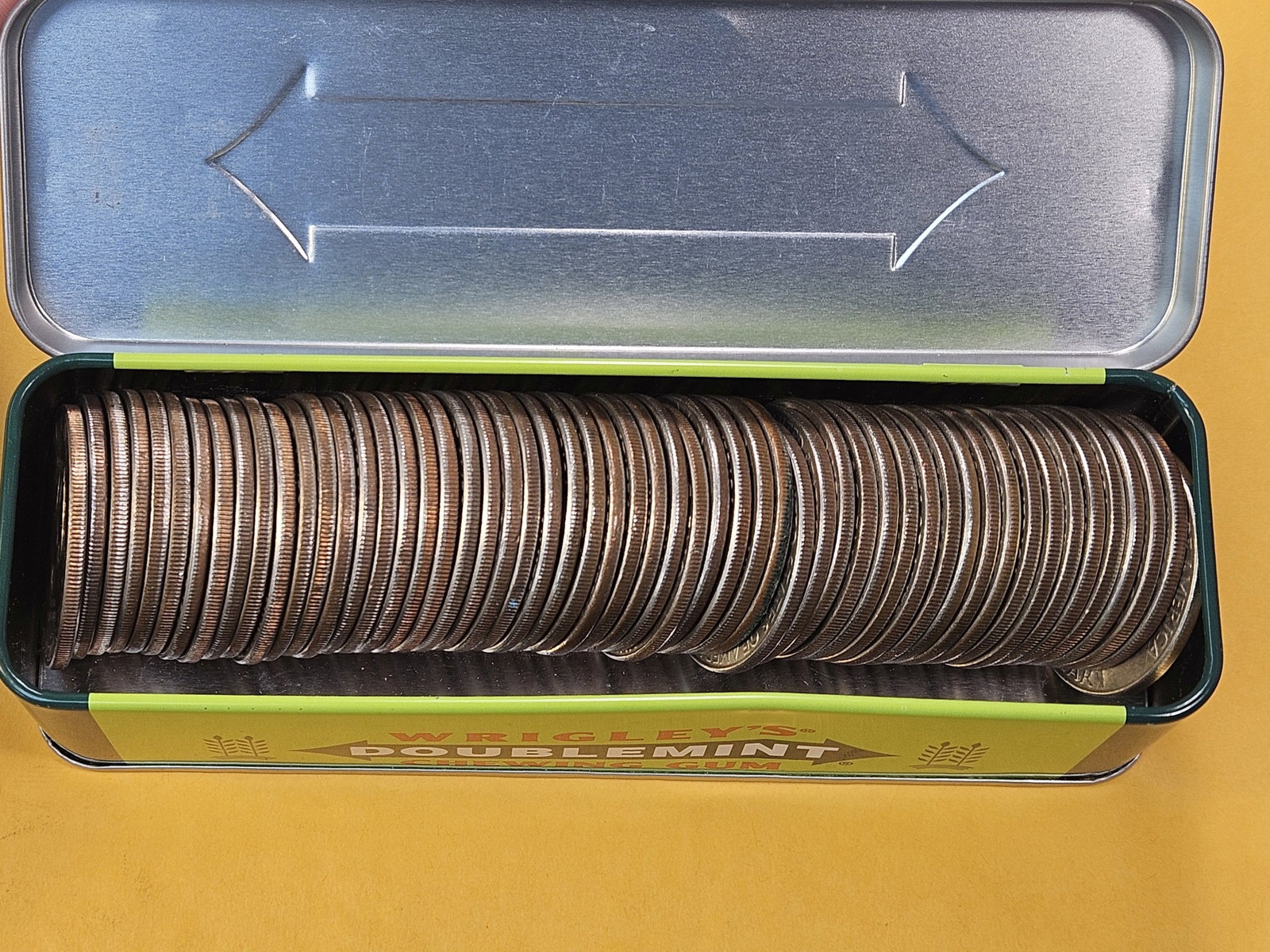 Fifty-five Eisenhower Dollars in old Wringlys Gum Tin - 2