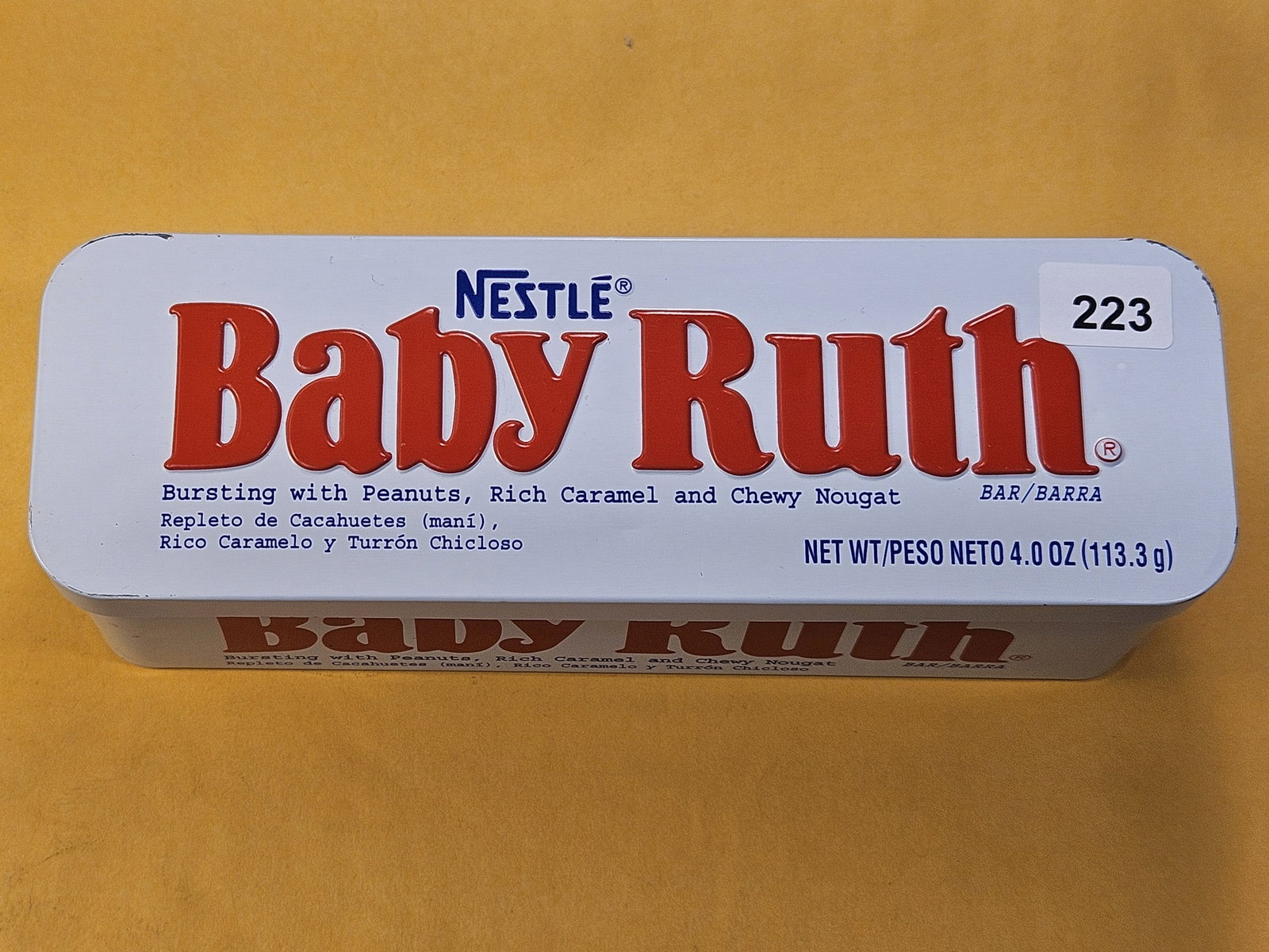Sixty-two Eisenhower Dollars in old Baby Ruth Tin: Fun packaging! *Ingredient list on the tin do not reflect the composition of the contents*