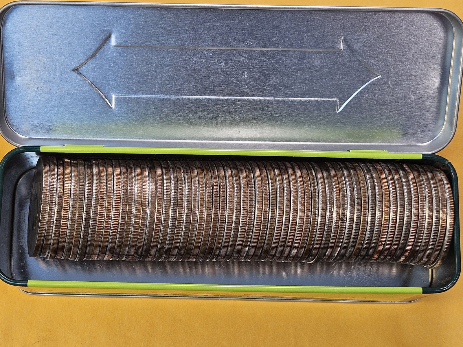 Fifty-eight Eisenhower Dollars in old Wringlys Gum Tin - 2