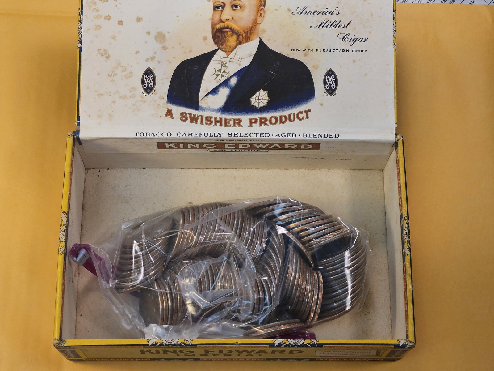 Ninety three Eisenhower Dollars on old Cigar Box - 2