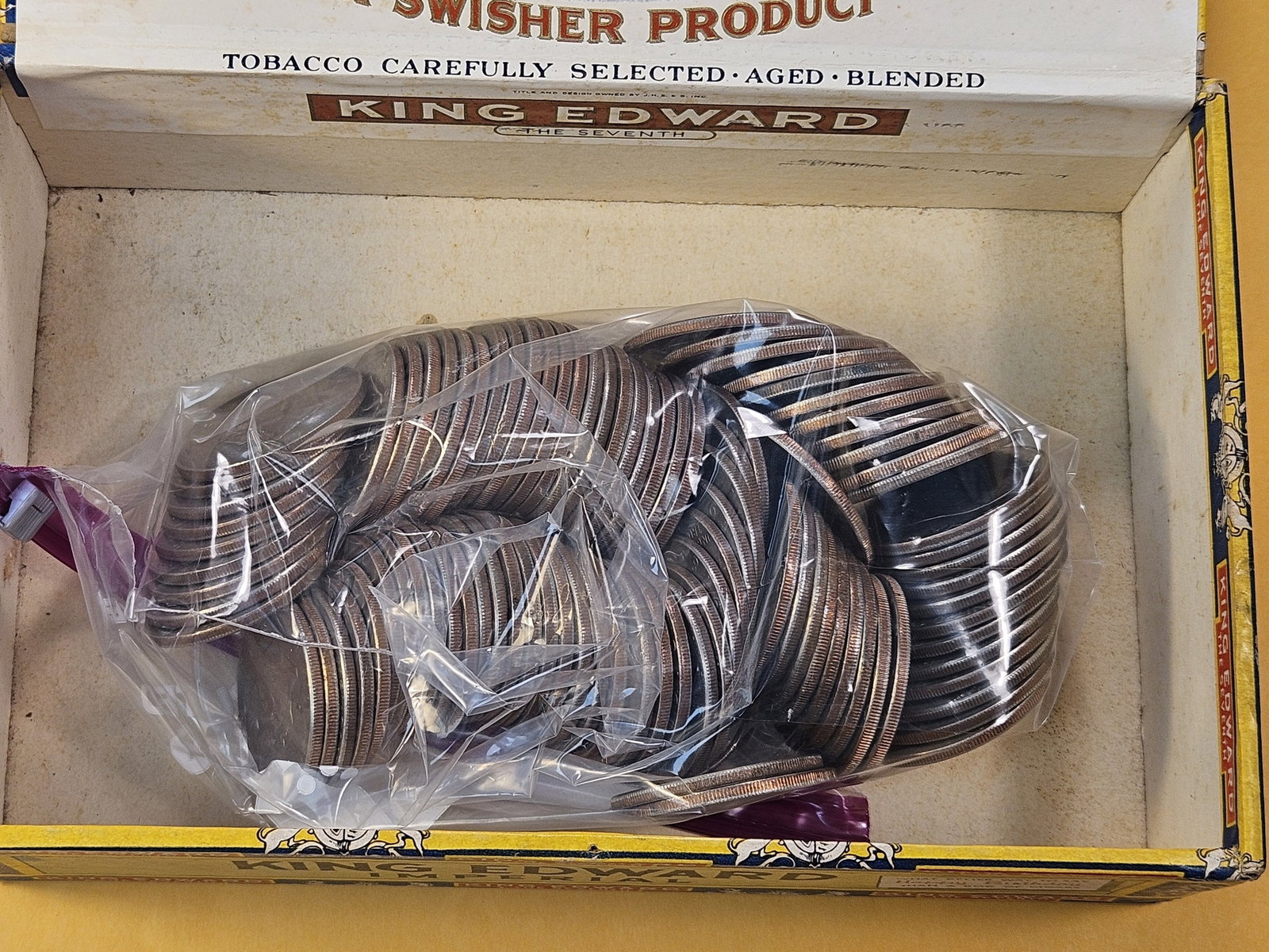 Ninety three Eisenhower Dollars on old Cigar Box - 3