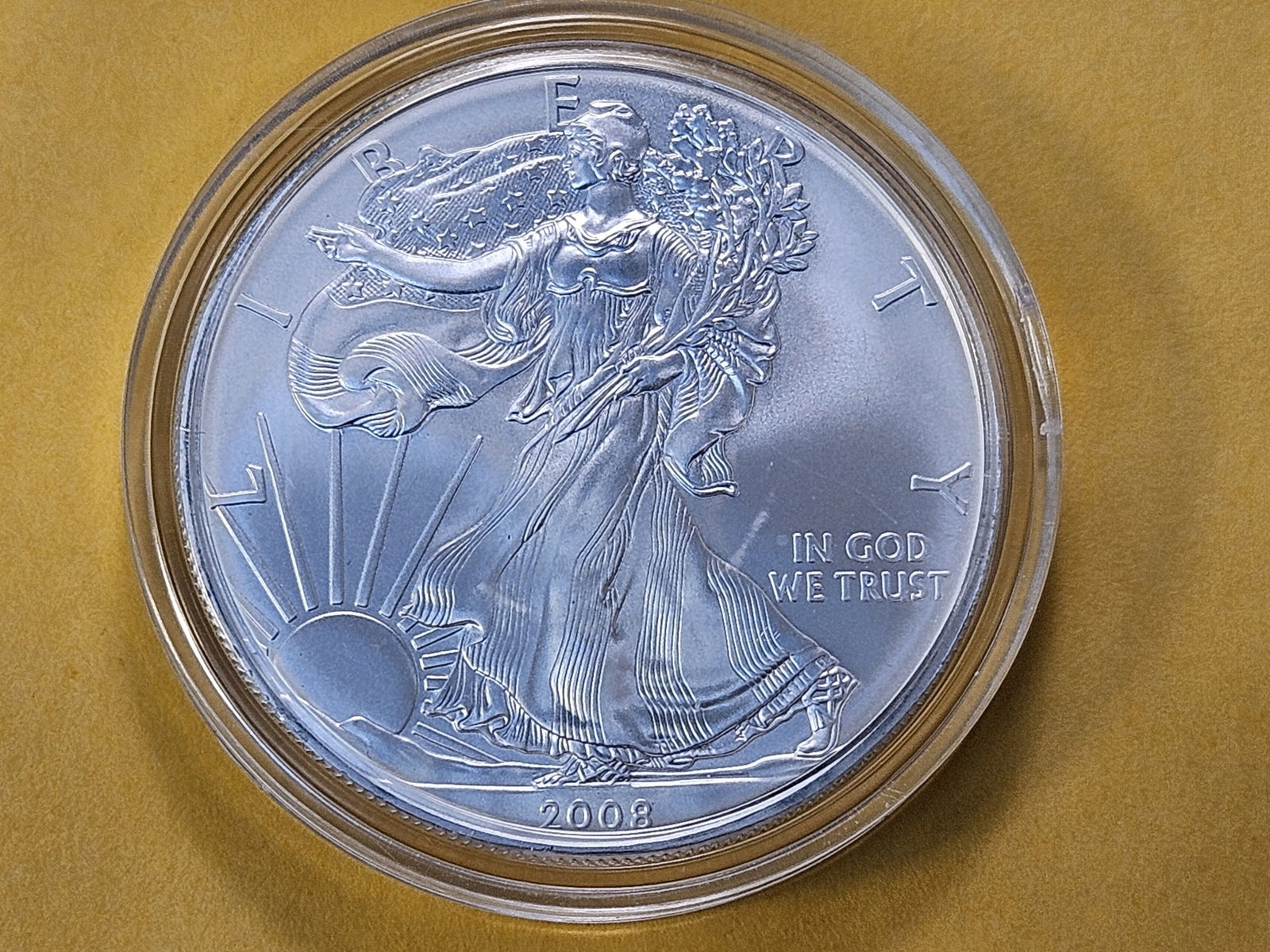 GEM Brilliant Uncirculated 2008 American Silver Eagle: Brilliant Cartwheel! In plastic capsule