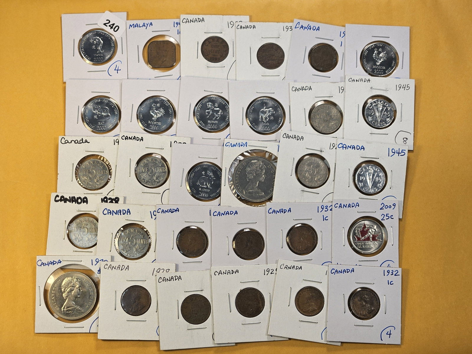Thirty Mixed Foreign Coins: Includes Coins from Canada, Malaya and Somalia