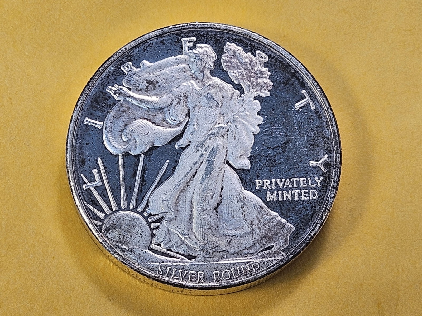 Two Troy Ounce .999 Fine Silver Round: Walking Liberty Half Dollar design. From Money Metals Exchange