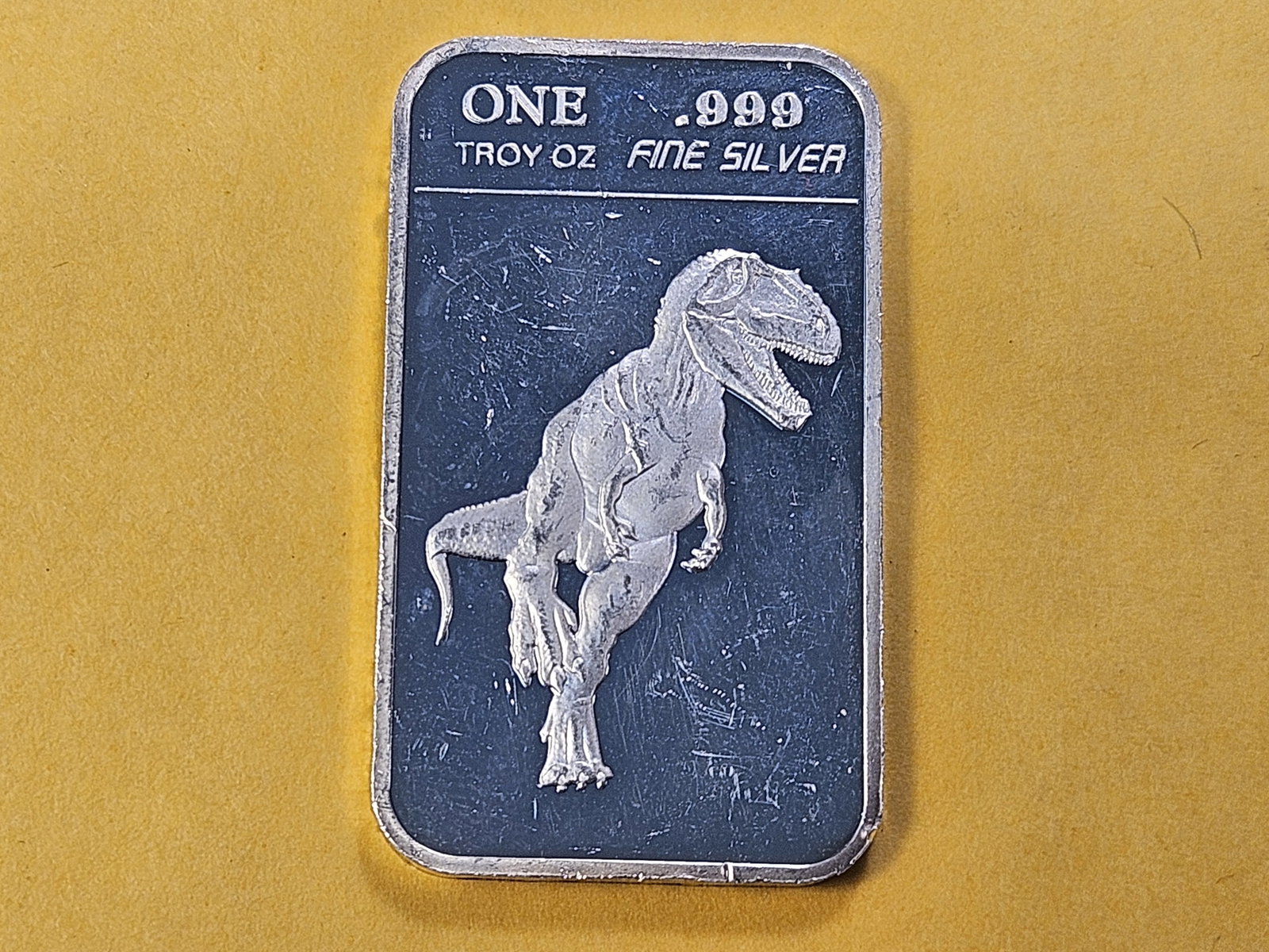 One Troy Ounce .999 Fine Silver Bar: Dinosaur Themed