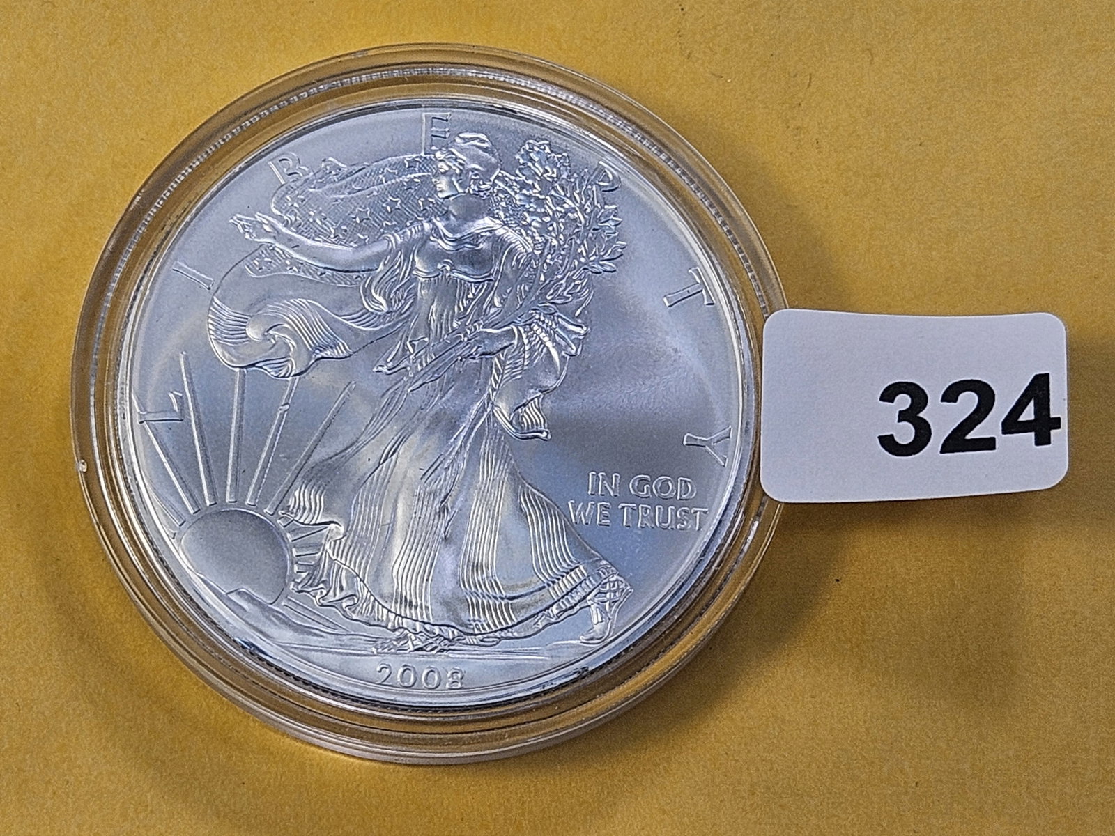 And last but not least, a GEM Brilliant Uncirculated 2008 American Silver Eagle: Thanks all for another great auction! Have a wonderful night, lovely week and we'll see y'all again next time!