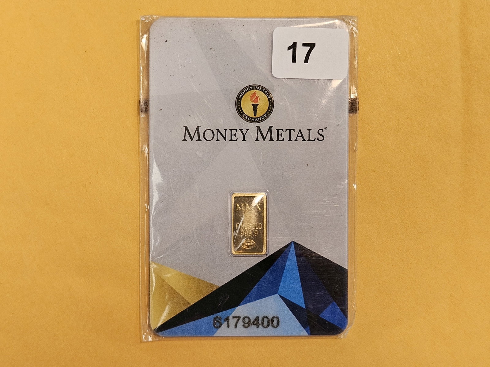 GOLD! Money Metals One-Half Gram .9999 fine gold bar: In original assay holder. Packaging is a little scuffy