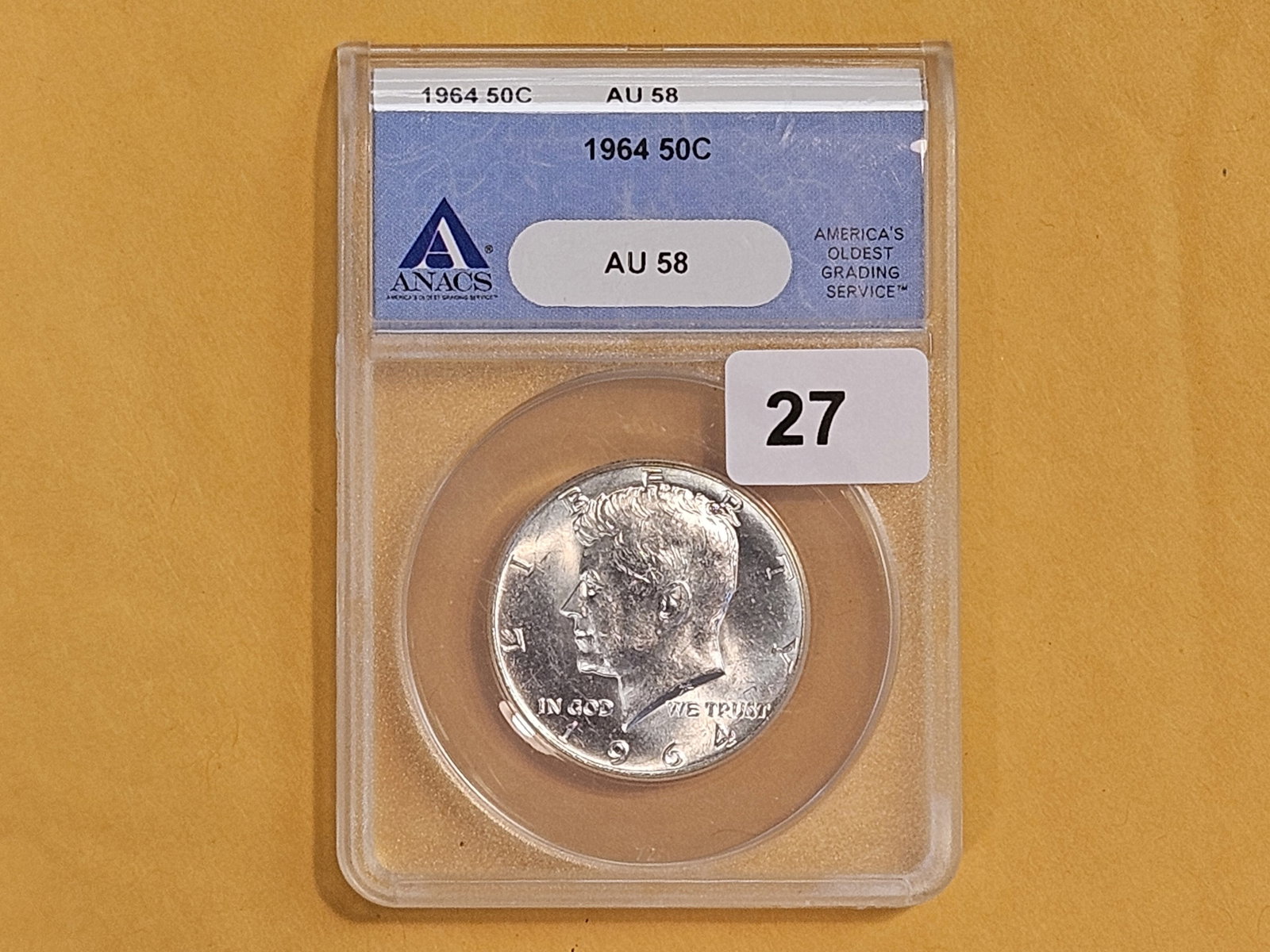 ANACS 1964 Kennedy silver Half Dollar in Brilliant About Uncirculatd 58: Only year for 90% silver Kennedy's
