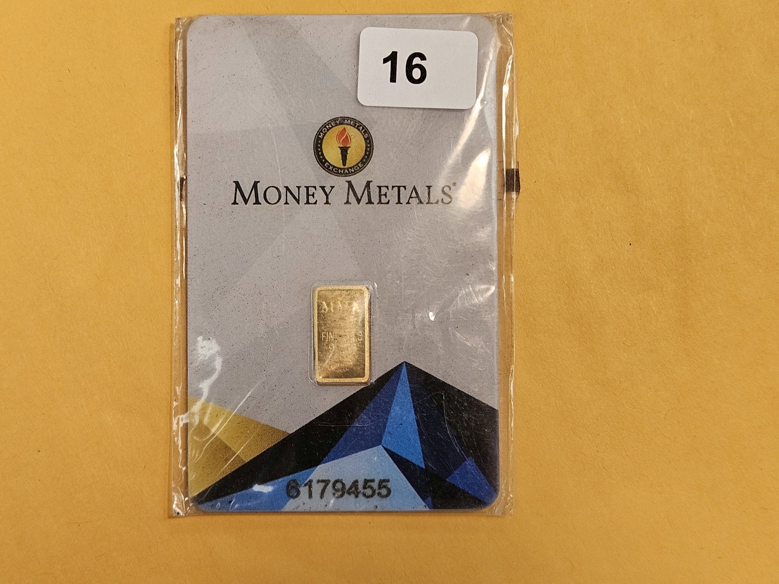 GOLD! Money Metals One-Half Gram .9999 fine gold bar: In original assay holder. Packaging is a little scuffy