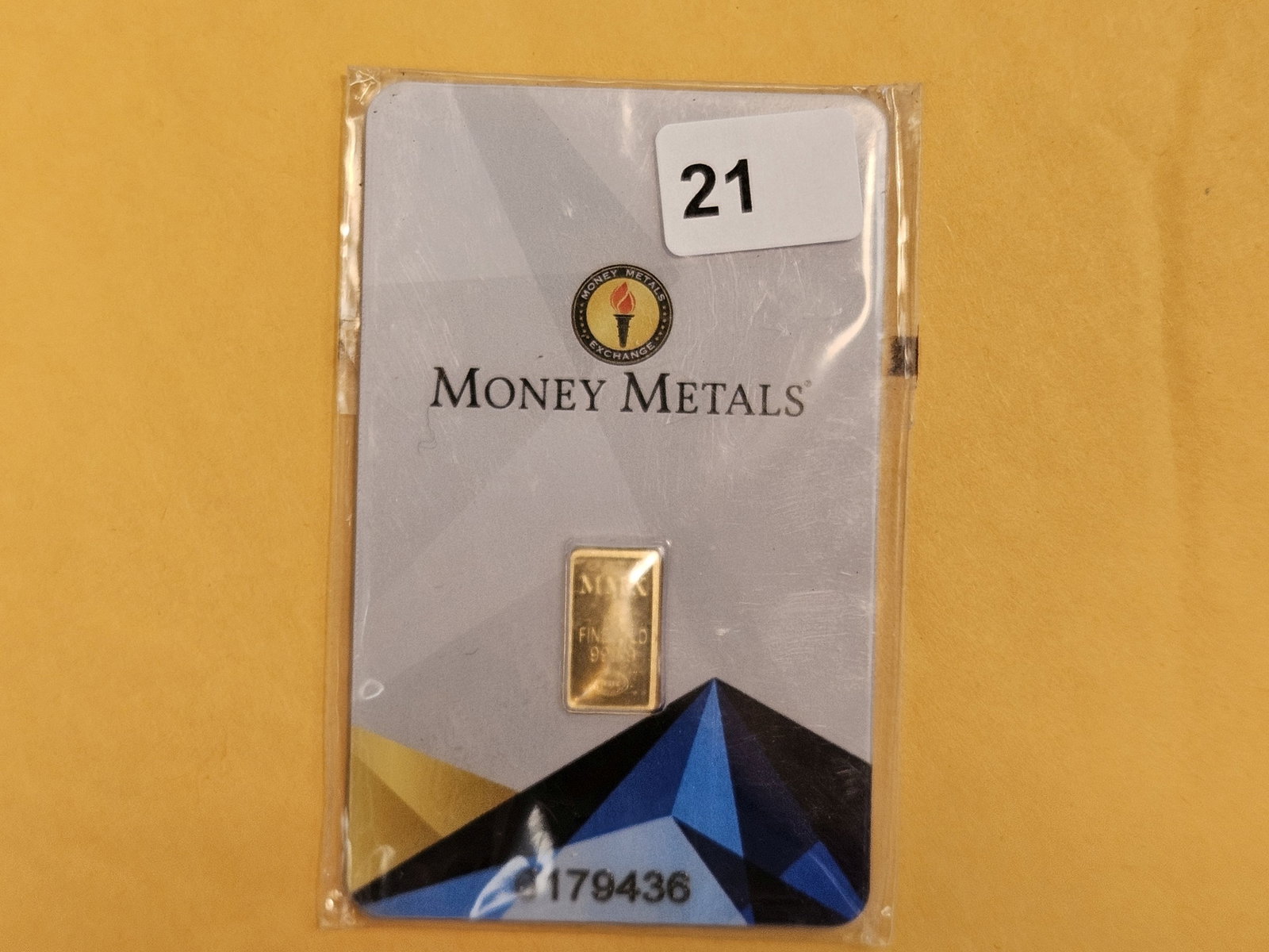 GOLD! Money Metals One-Half Gram .9999 fine gold bar: In original assay holder. Packaging is a little scuffy