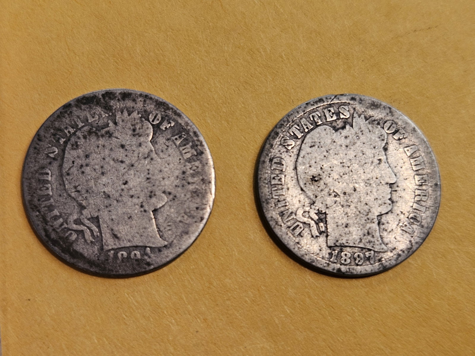 Two Semi-Key Barber silver Dimes in About Good: 1894-O and 1897-S