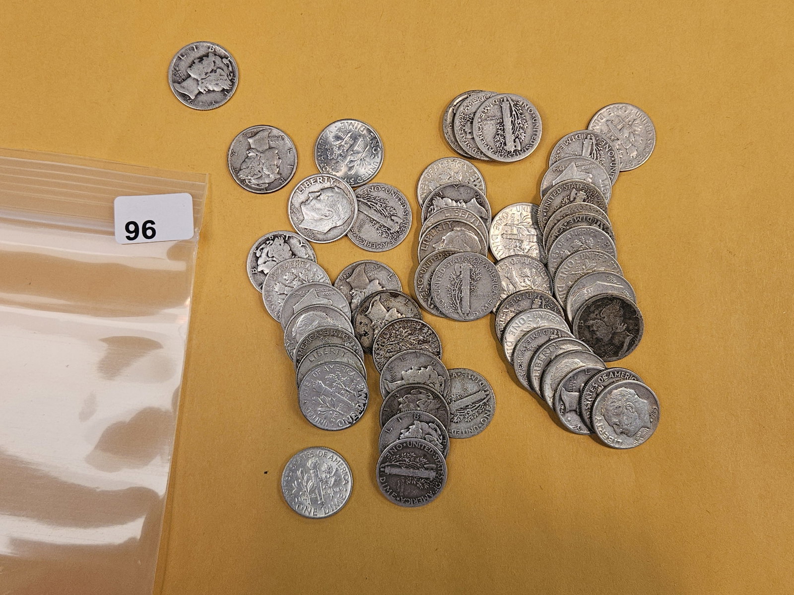 Fifty mixed silver Dimes (1 of 2)