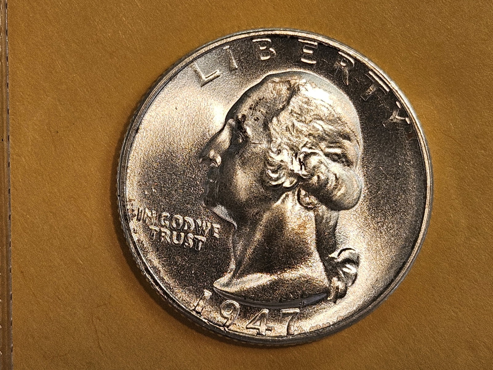 GEM Brilliant Uncirculated 1947-S Washington Quarter: Gleaming luster