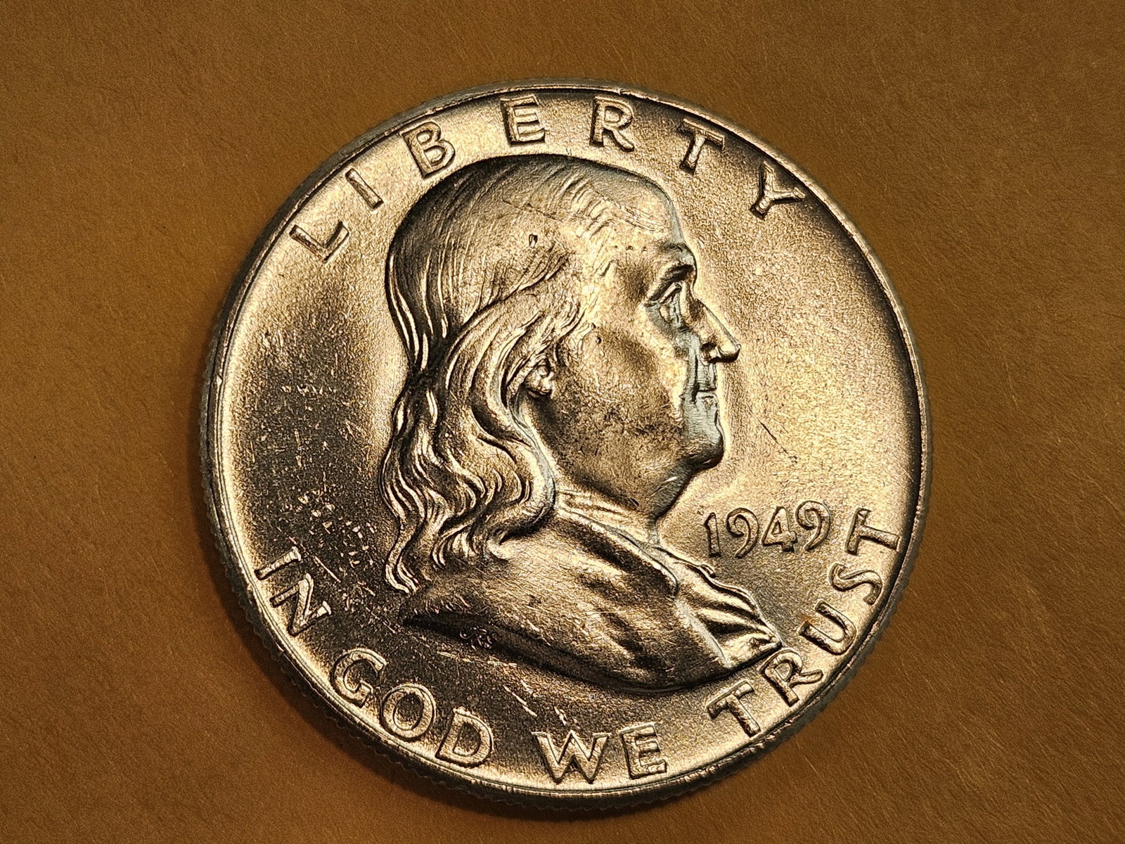 Choice Brilliant Uncirculated 1949 Franklin Half Dollar FBL: Full Bell Lines