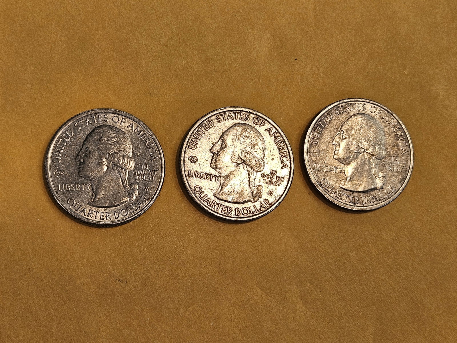 Three West Point-minted Washington Quarters: Circulated