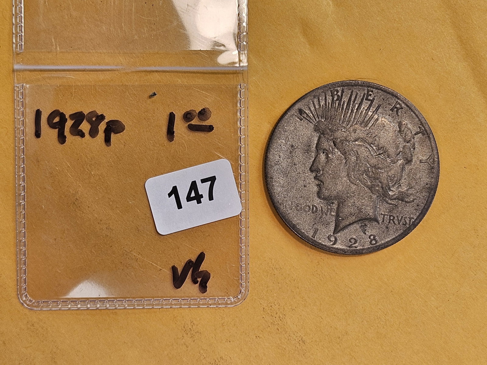 * KEY DATE * 1928 Peace silver Dollar in Very Good - 2