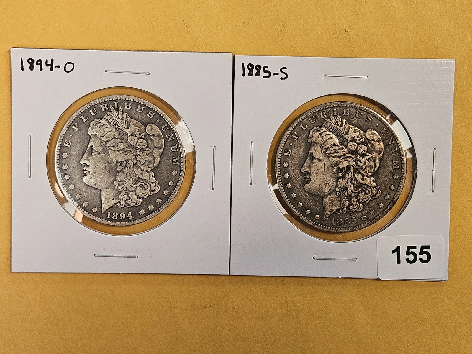 Two Better Date Morgan Silver Dollars: 1894-O and 1885-S