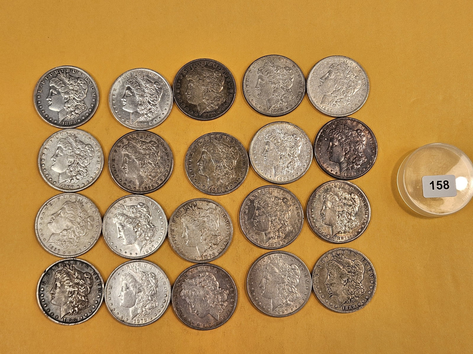 ** FULL ROLL ** Twenty Morgan Silver Dollars: All pre-1904. Grades from Very Fine through About Uncirculated plus