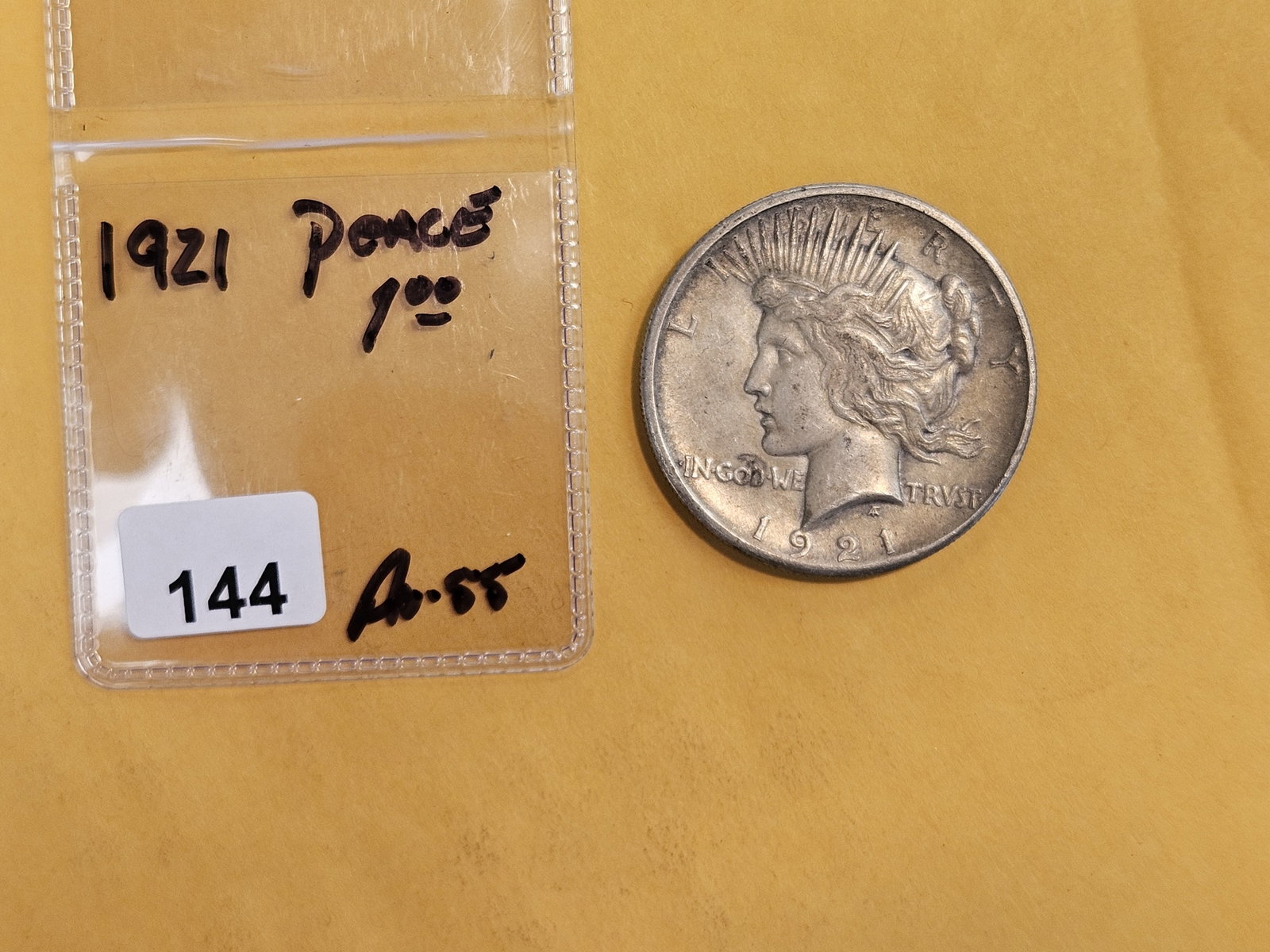 ** KEY DATE ** 1921 Peace Silver Dollar in About Uncirculated plus - 2