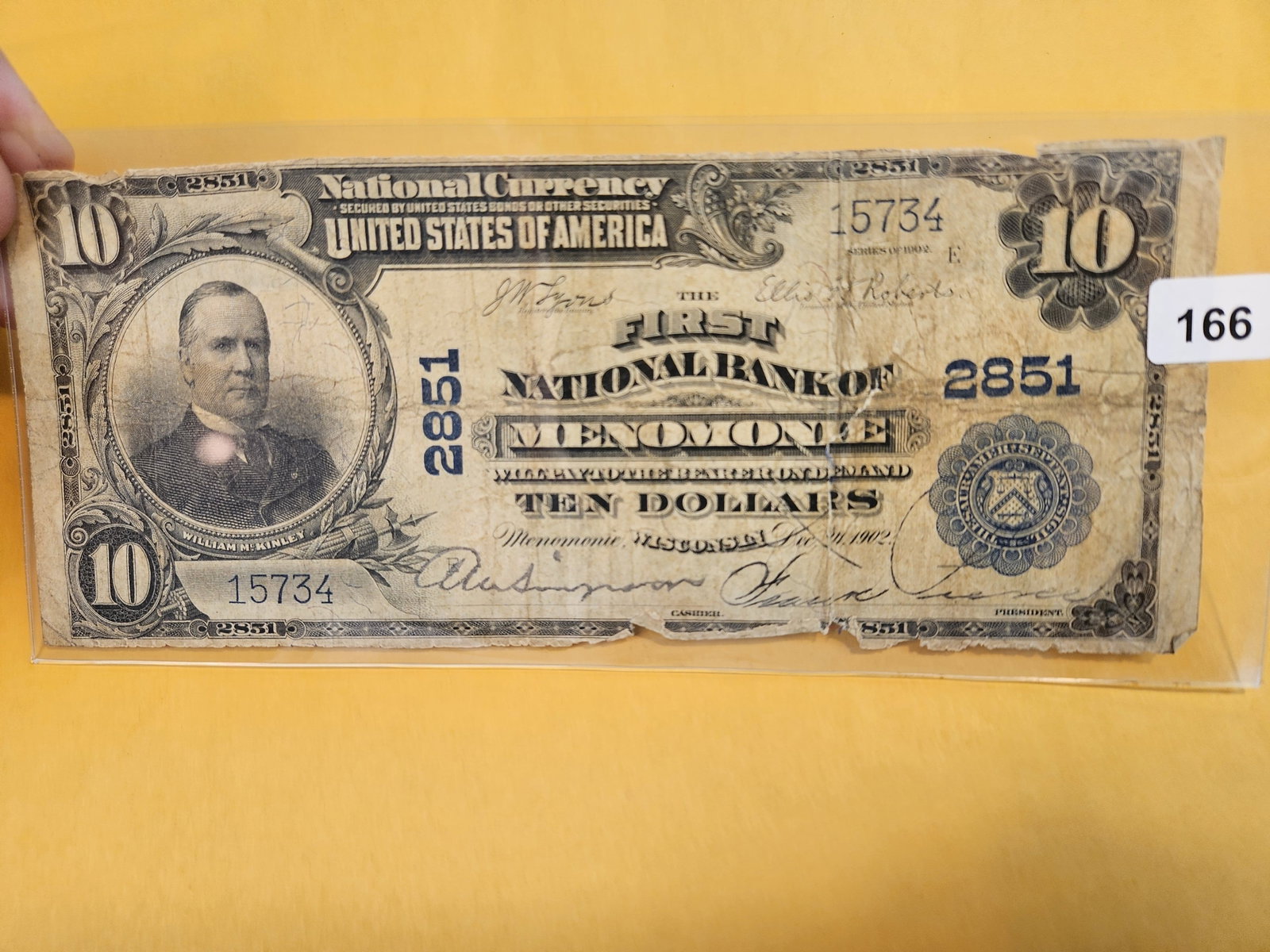 Scarcer Series of 1902 Large Size National Currency Ten Dollars: First National Bank of Menomone, Wisconsin