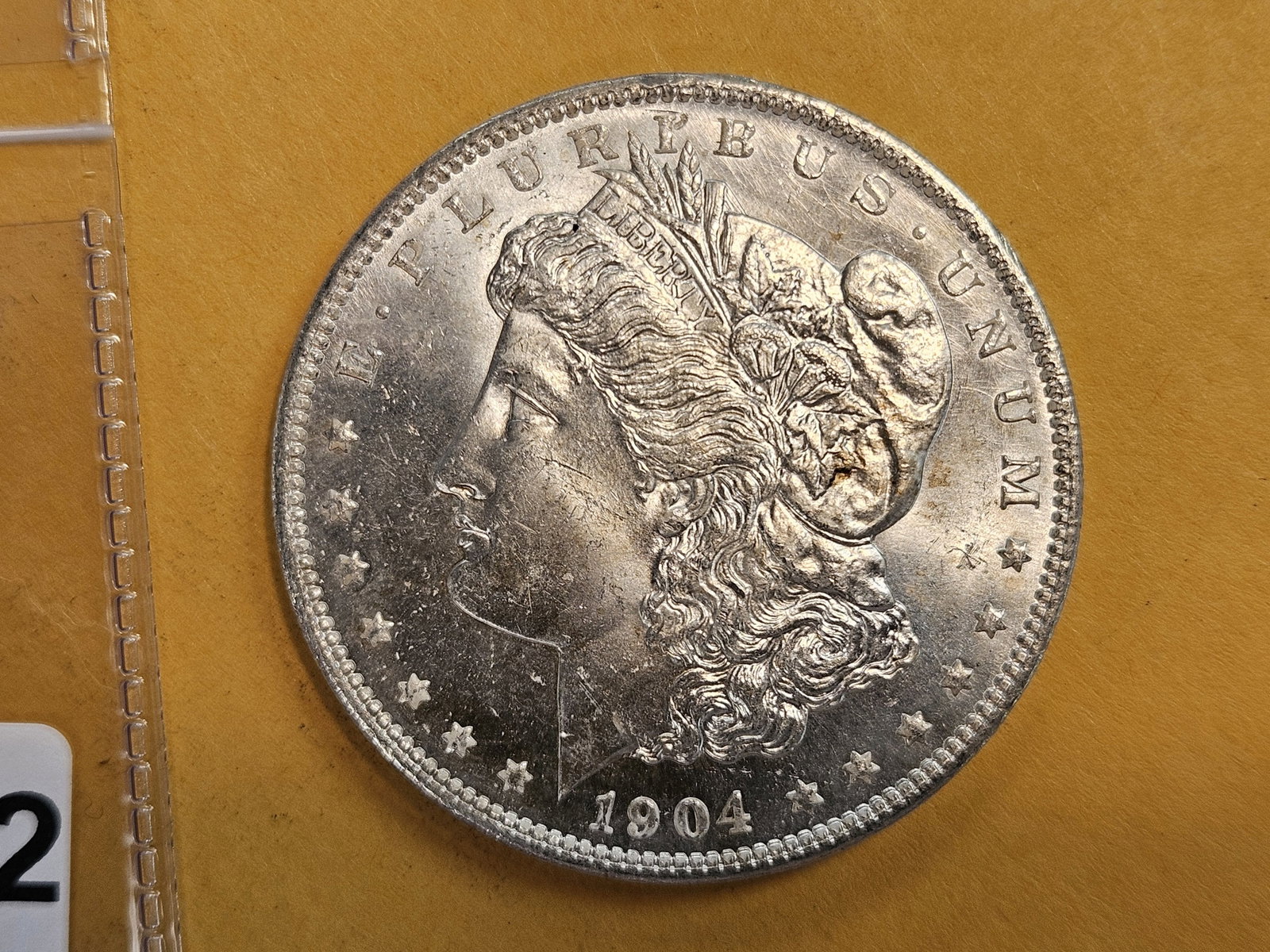 Very Choice Brilliant Uncirculated 1904-O Morgan Dollar: Semi-Prooflike fields