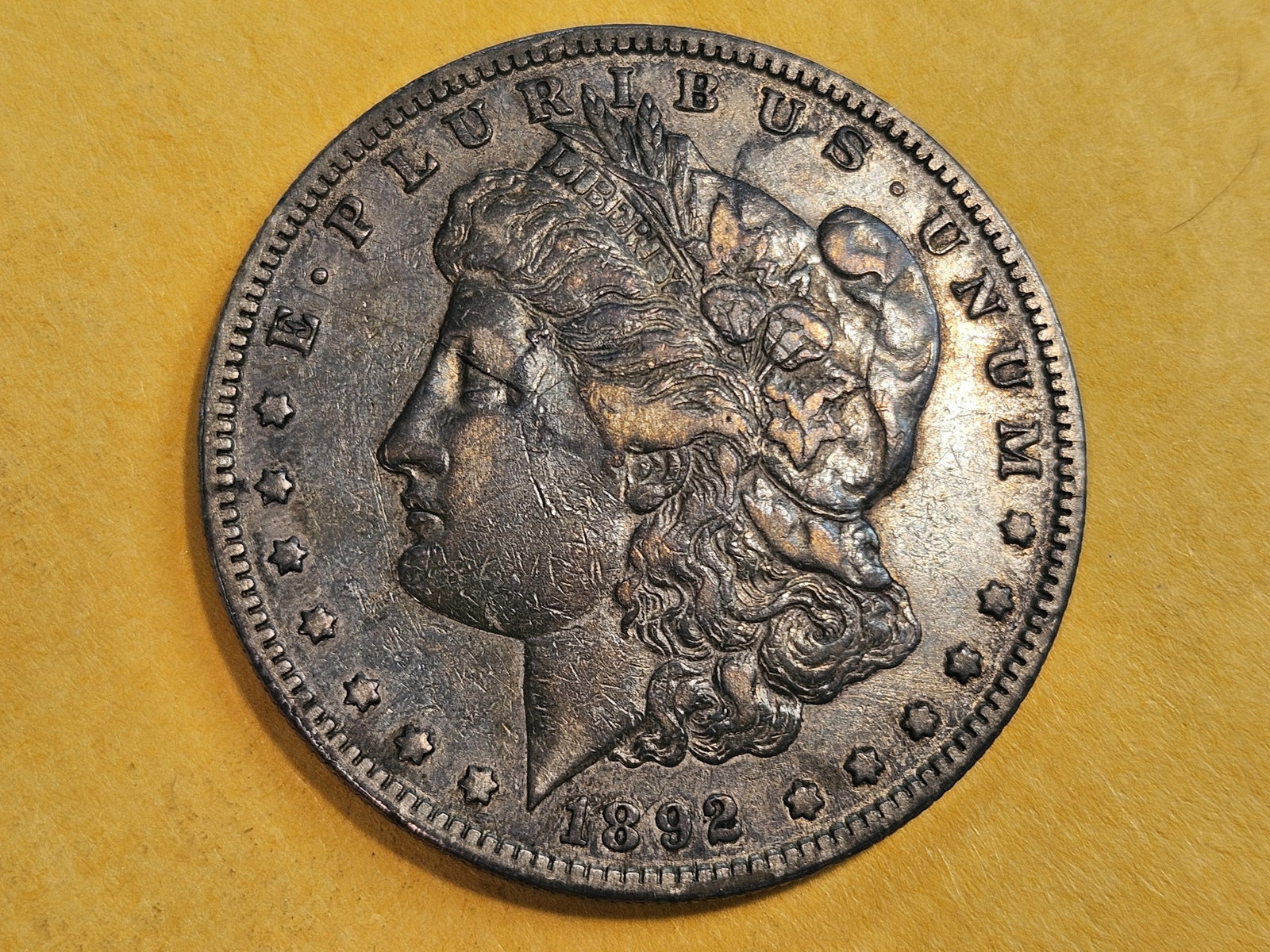 Better Date 1892-S Morgan Dollar in Very Fine plus: Purt near XF