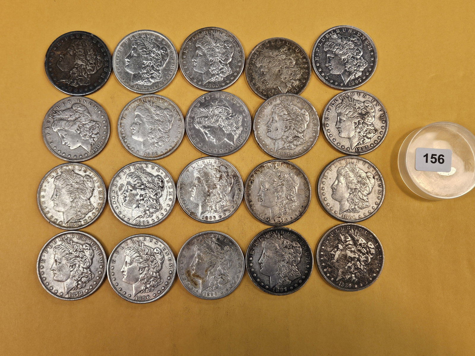 ** FULL ROLL ** Twenty Morgan Silver Dollars: All pre-1904. Grades from Very Fine through About Uncirculated plus