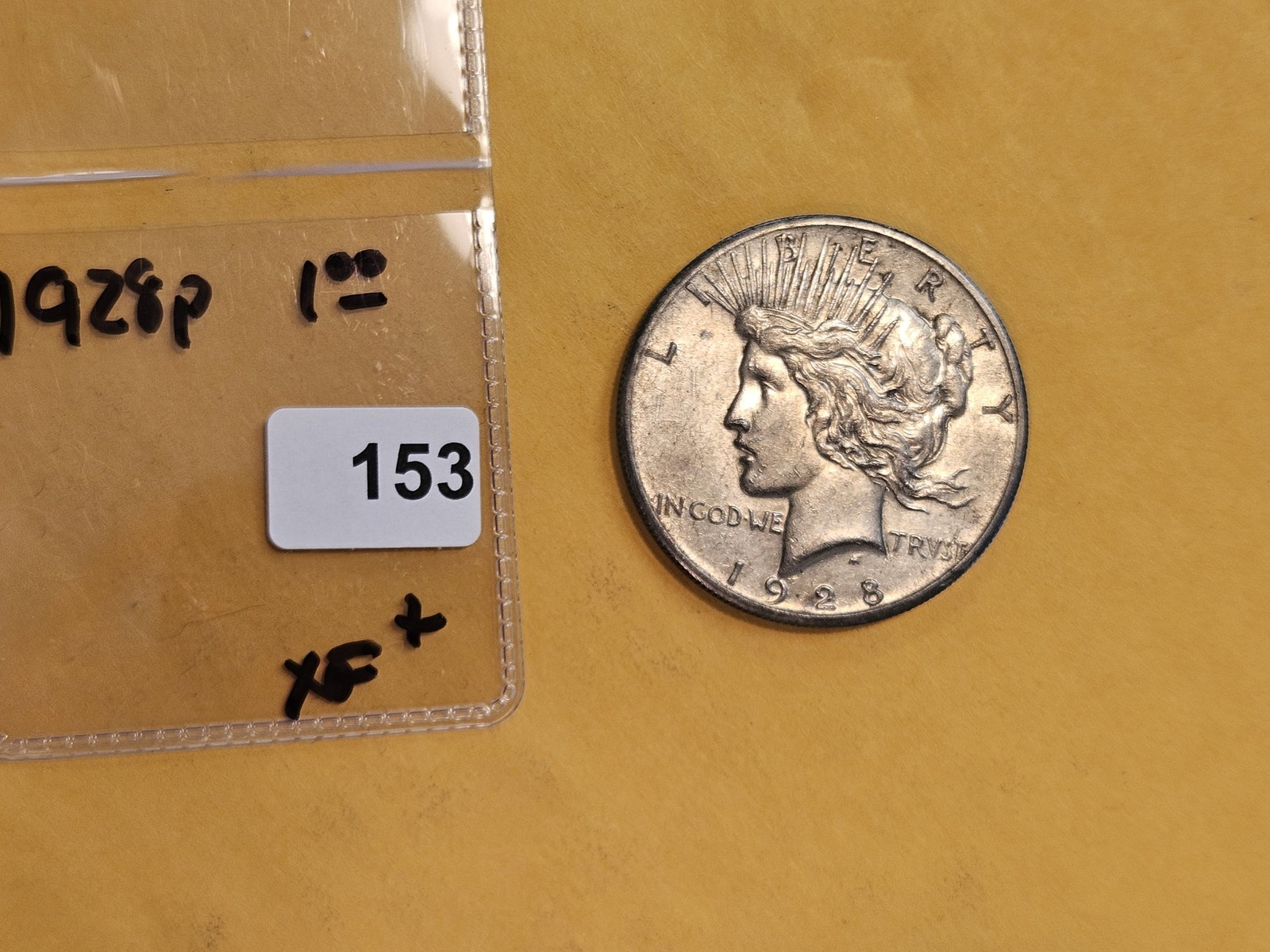 Key Date 1928 Peace silver Dollar in Extra Fine plus - 2