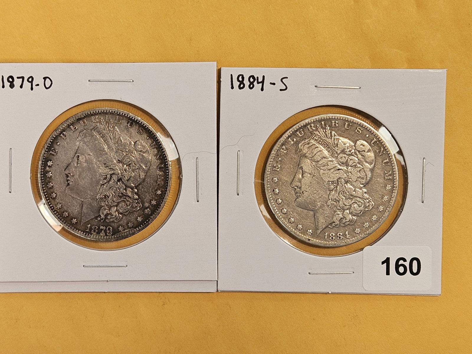 Two Better Date Morgan Silver Dollars: 1879-O and 1884-S