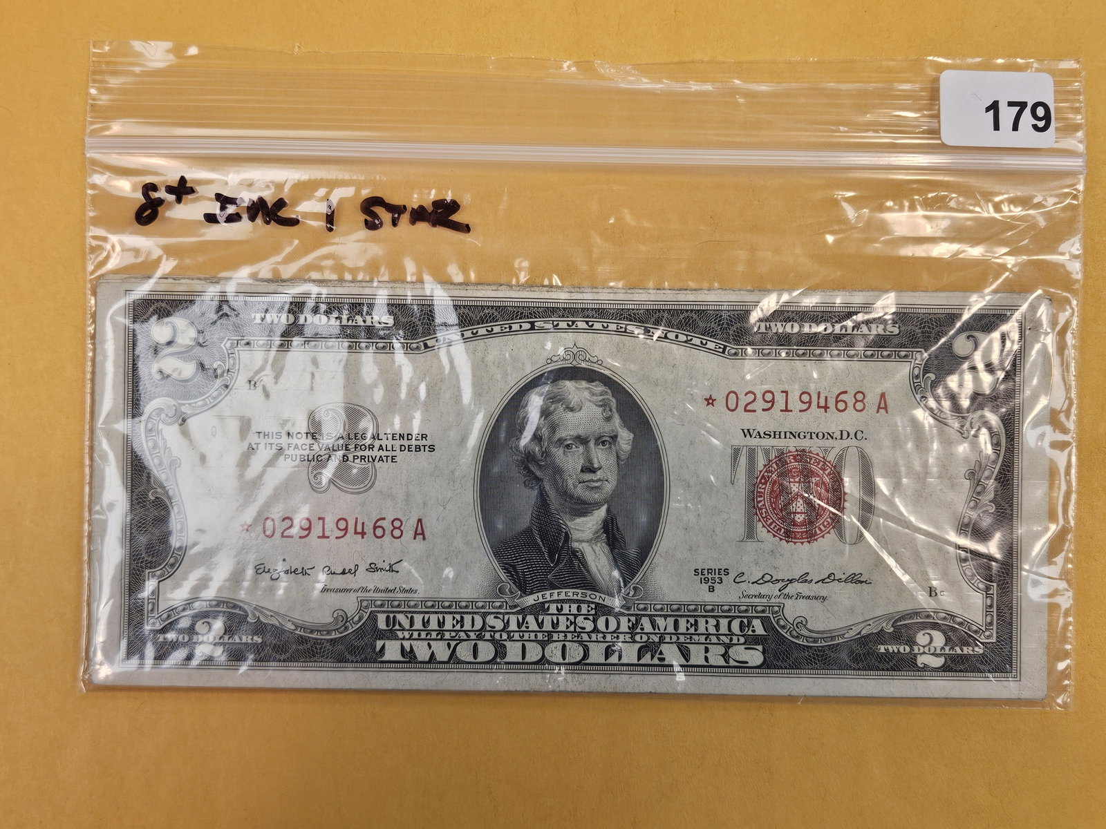 Eight mixed Two Dollar Red Seal US Notes: Includes one Star replacement note