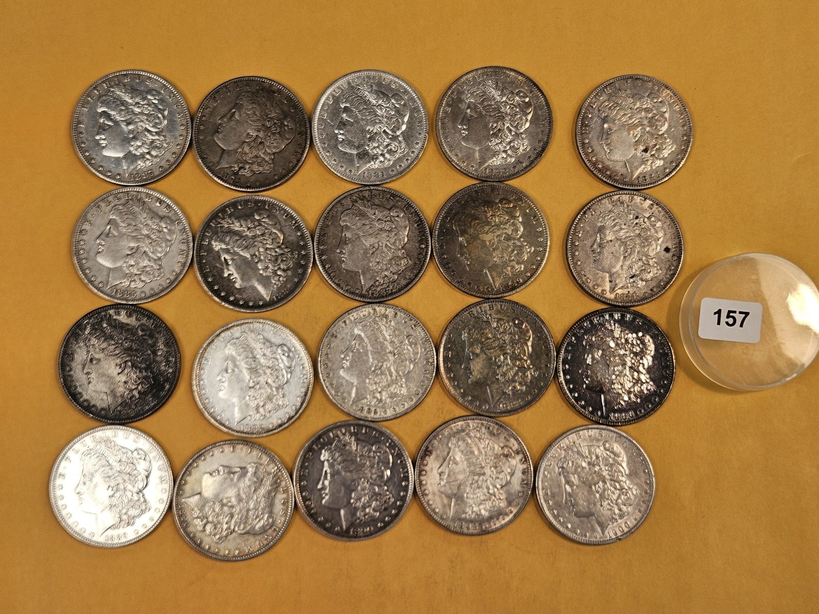 ** FULL ROLL ** Twenty Morgan Silver Dollars: All pre-1904. Grades from Very Fine through Brilliant Uncirculated - details