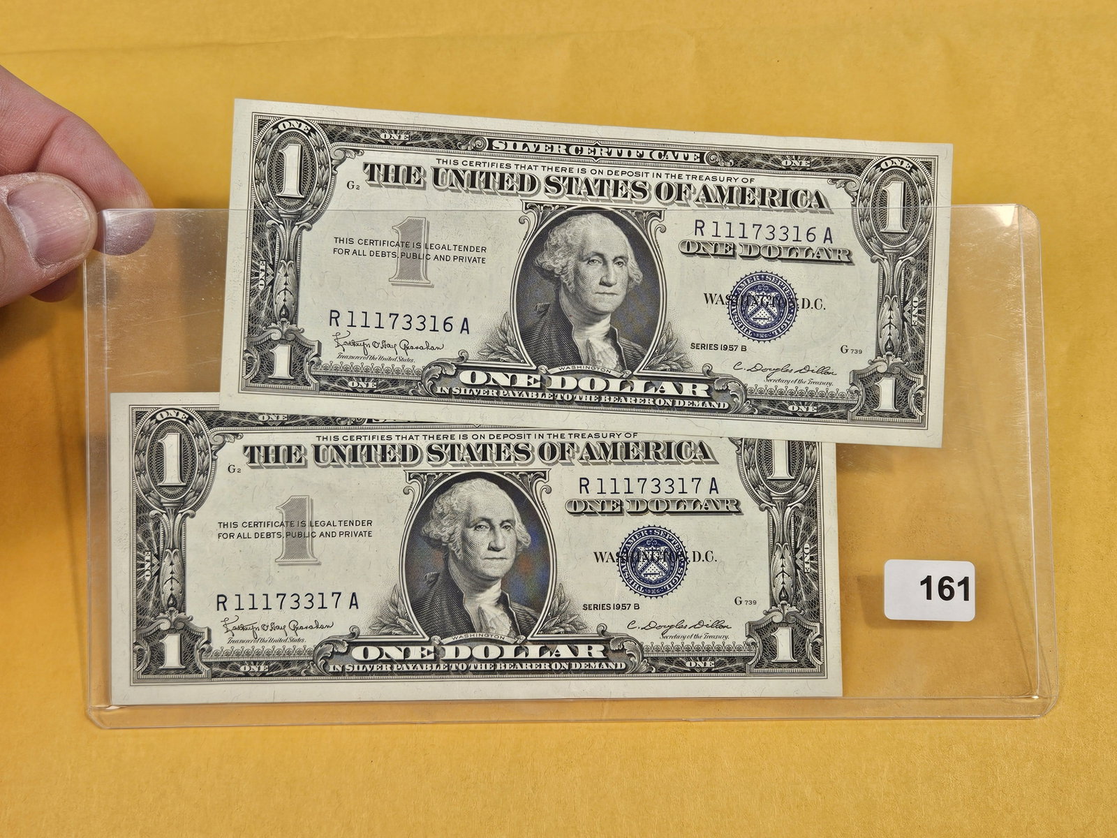 Two Crisp Uncirculated Series 1957-B One Dollar Silver Certificates: Sequential