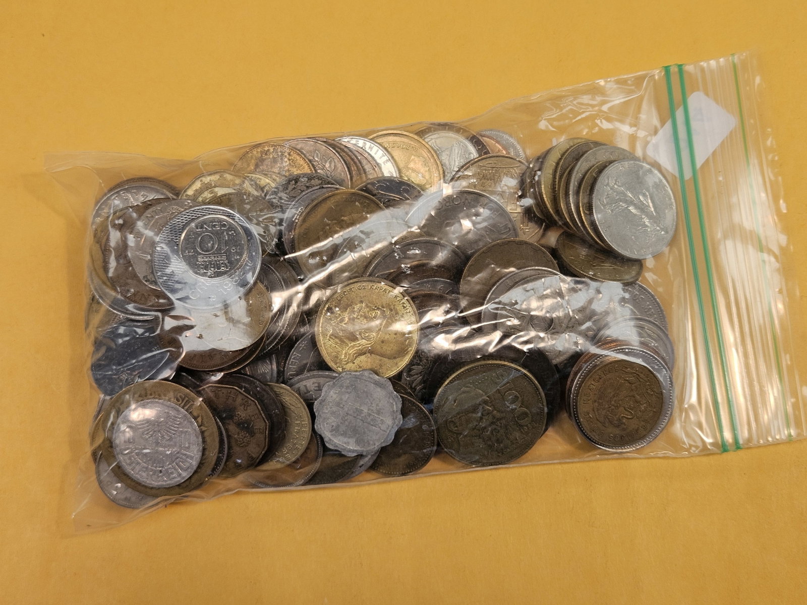 ONE and one-quarter Pound of mixed World Coins - 2