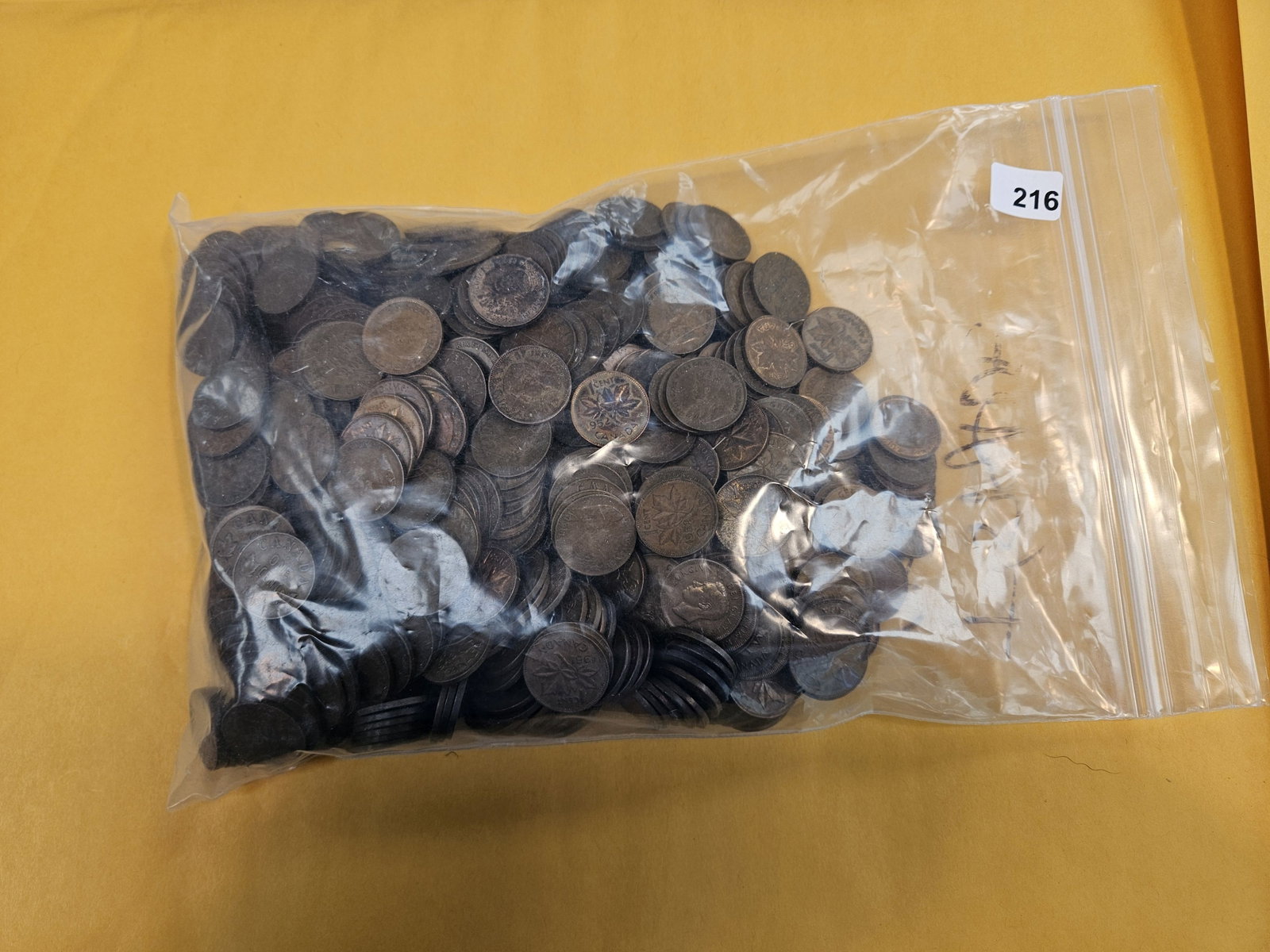 Over TWO Pounds of Canadian cents: I think they're all Canadian small cents. Unchecked by us