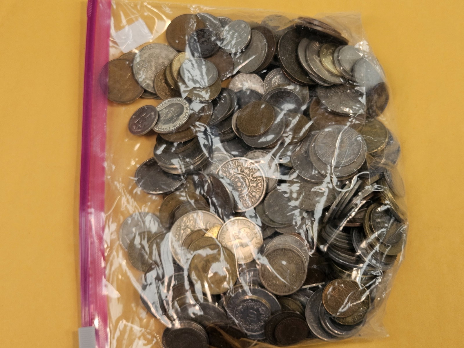 THREE and one-half Pounds of mixed World coins - 2