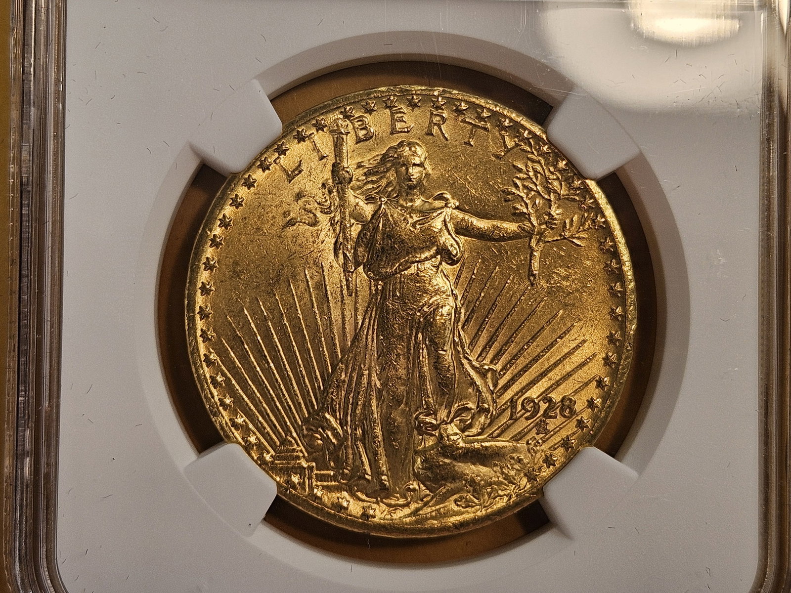 GOLD! NGC 1928 Saint Gaudens Gold Twenty Dollars in Mint State 63: Great luster